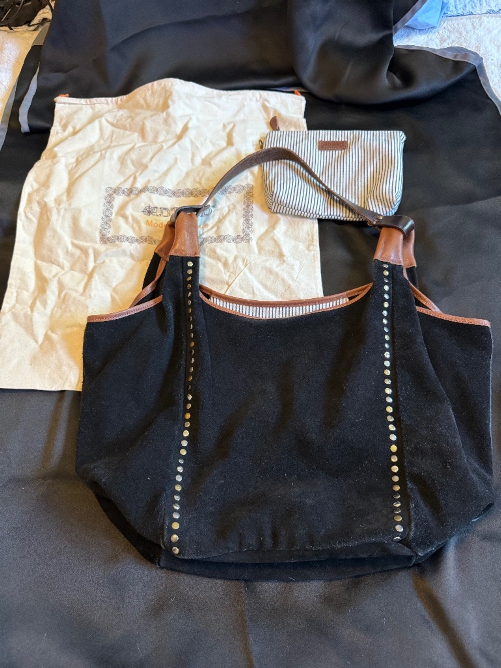 Old world suede bag